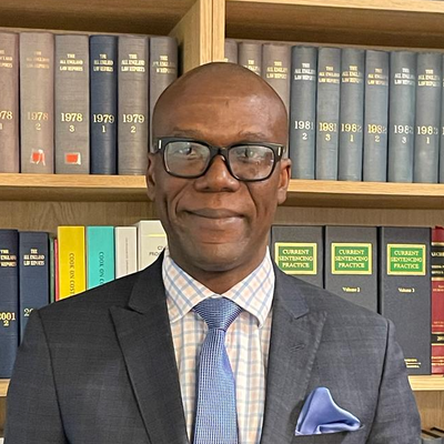 Kayode Okenla from Simon Bethel Solicitors